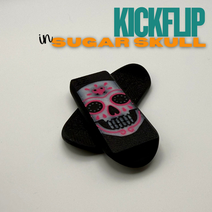 Black boards with pink skull design on a white background, featuring 'KICKFLIP' branding.
